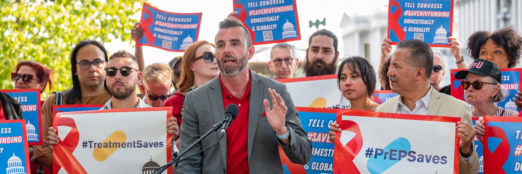 HIV advocate Jeremiah Johnson pictured speaking at a rally in September in front of the Capitol
