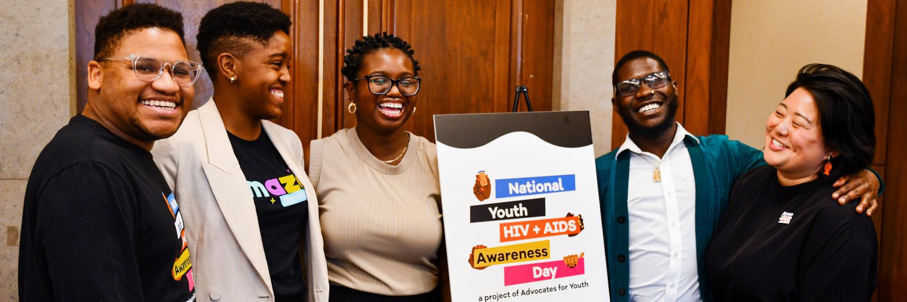 a group of youth HIV stand gather before their congressional briefing