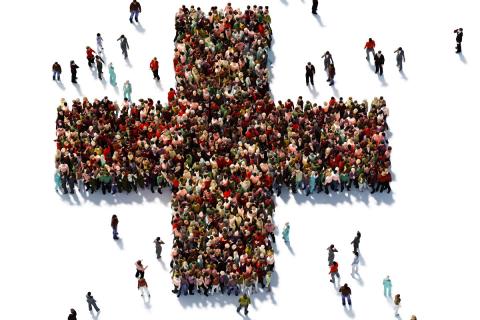 Crowd of people in the form of a medical cross symbol